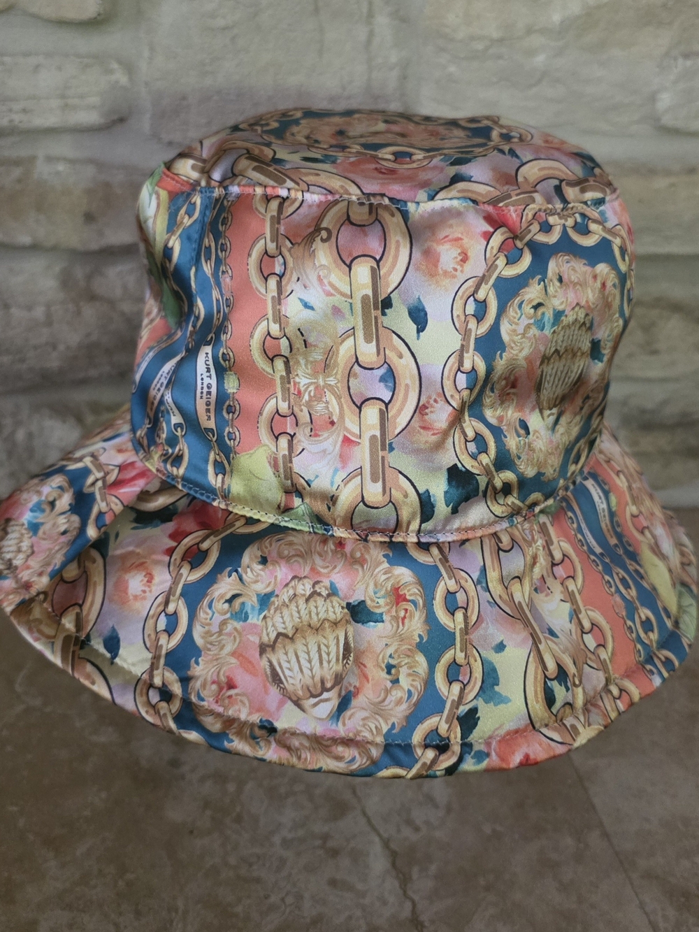 Kurt Geiger Chain & Floral Satin Bucket Hat in Coral, Teal & Gold